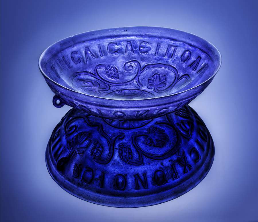 The transparent blue glass bowl