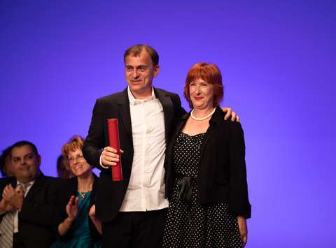 Director Blaž Peršin receiving the award in Berlin